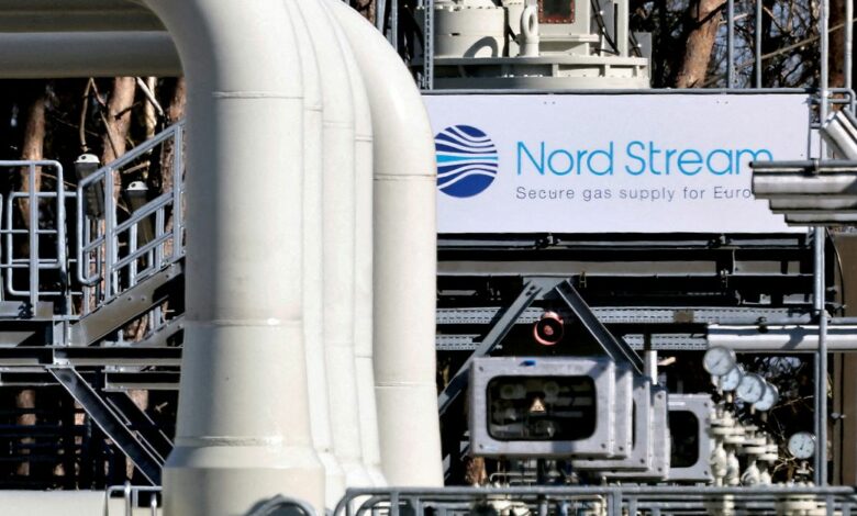 Illustration shows natural gas pipeline and Gazprom logo
