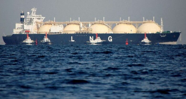 An LNG tanker is tugged towards a thermal power station in Futtsu, Japan