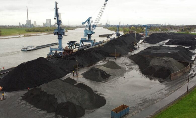 Aerial view of a dry bulk terminal with coal along the river Rhine