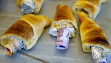 Money seized by German customs agency Zoll during anti-money laundering operation is displayed before agency