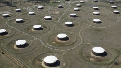 Crude oil storage tanks are seen from above at the Cushing oil hub in Cushing