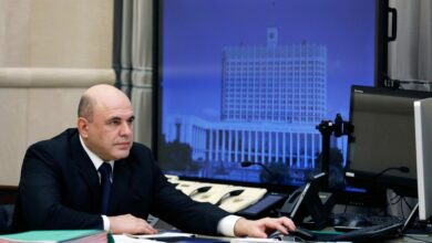 Russian Prime Minister Mikhail Mishustin chairs a meeting with members of the government via video link in Moscow