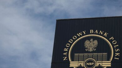 A logo of the Polish Central Bank (NBP) is seen on their building in Warsaw