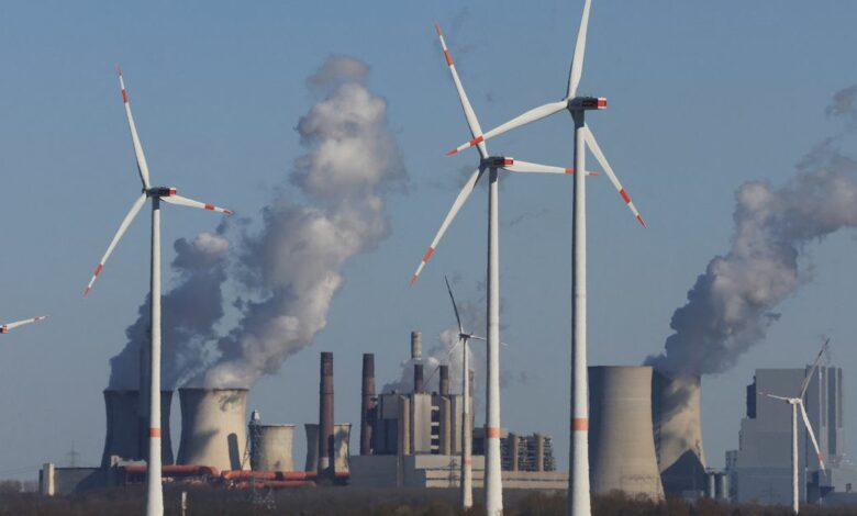 Windmill power plants and brown coal fired power plants of RWE, one of Europe