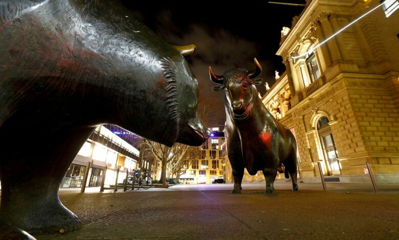 Bull and bear symbols are seen in front of the German stock exchange (Deutsche Boerse) in Frankfurt