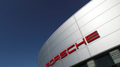 A logo of Porsche is seen outside a Porsche car dealer, amid the coronavirus disease (COVID-19) outbreak in Brussels