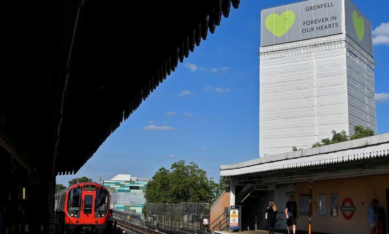 The scaffold clad Grenfell Tower is seen from Latimer Road tube station in London, Britain