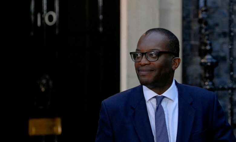 New British Health Chancellor of the Exchequer Kwasi Kwarteng walks outside Number 10 Downing Street in London