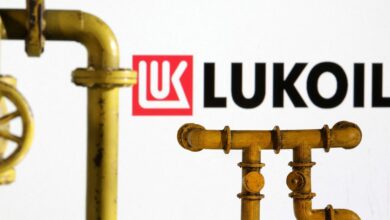 Illustration shows natural gas pipeline and Lukoil logo