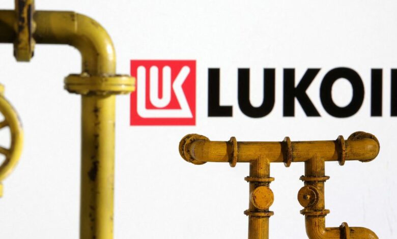 Illustration shows natural gas pipeline and Lukoil logo