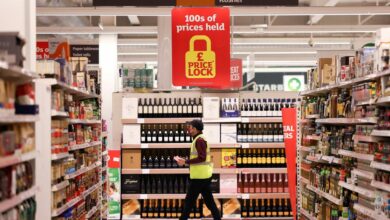 A logo of Tesco is pictured outside a Tesco supermarket in Hatfield