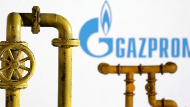 Illustration shows natural gas pipeline and Gazprom logo