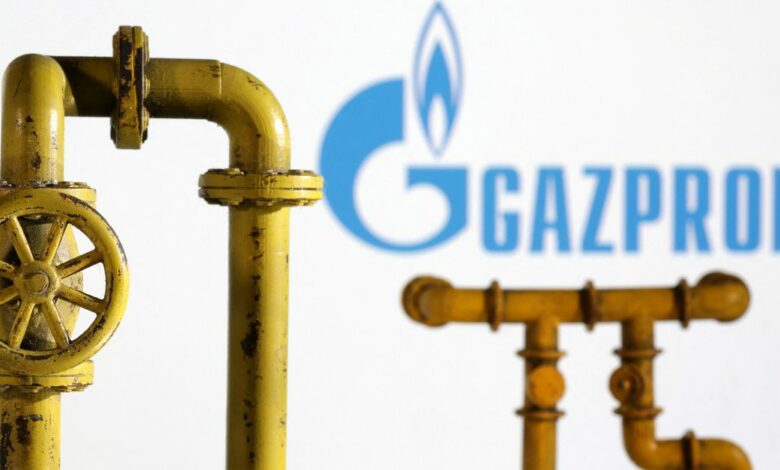 Illustration shows natural gas pipeline and Gazprom logo