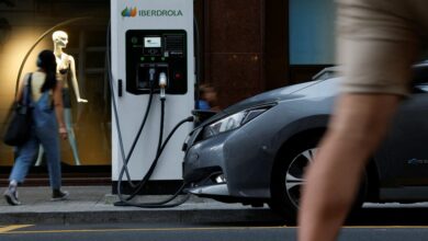 An electric vehicle is plugged into an Iberdrola charging station in Bilbao